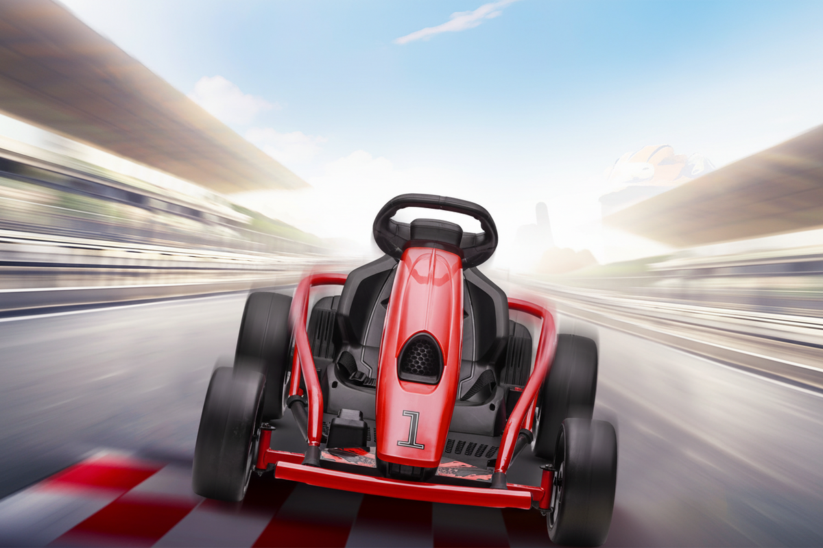 24V kids electric drift go-kart racing on track, front angle action shot
