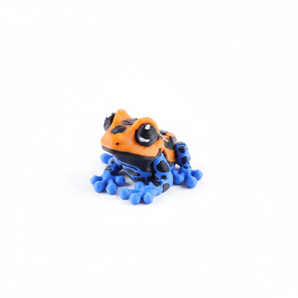 Orange and blue dart frog fidget toy on white background